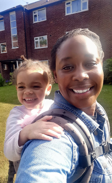 Parenting Support Collective in Manchester and Greater Manchester Boroughs smiling mum and baby on a sunny day