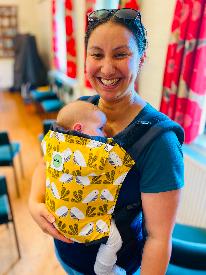Kirsty Manchester Babywearing Consultant carrying her fourth child in a Kahu sling
